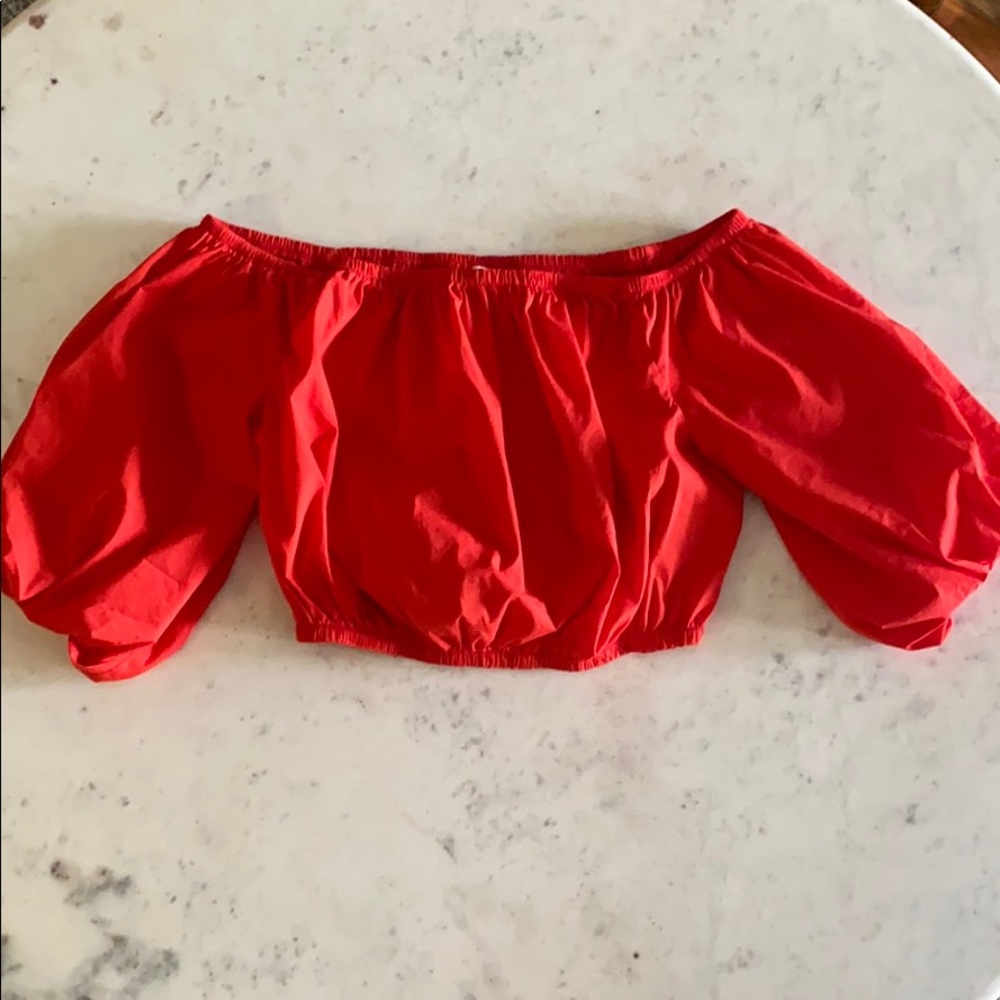 Red slightly cropped top
